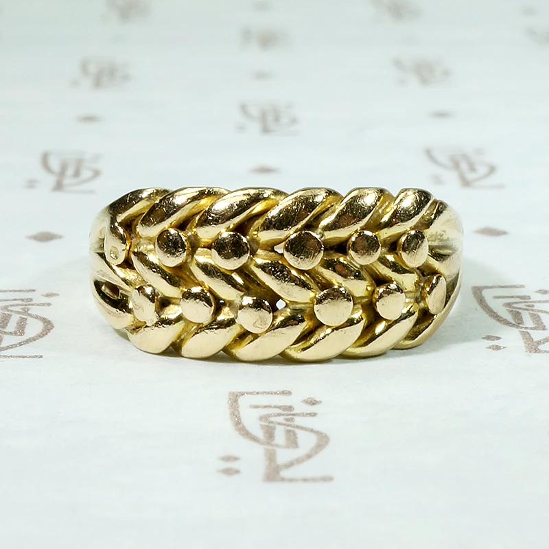 Plaited 18ct Gold Keeper Ring with Ball Details