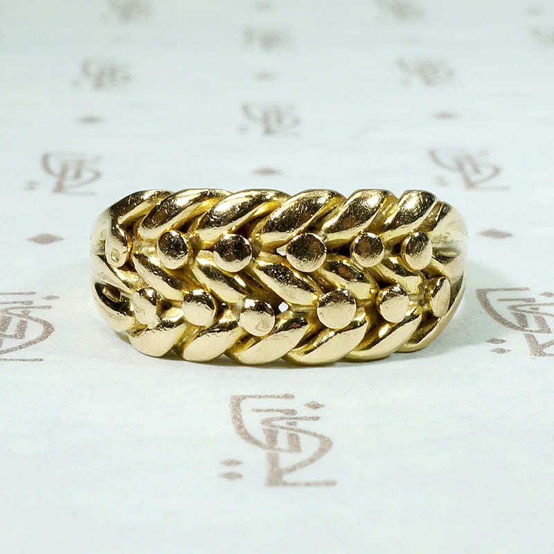 Plaited 18ct Gold Keeper Ring with Ball Details