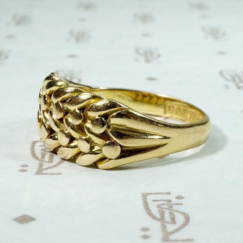 Plaited 18ct Gold Keeper Ring with Ball Details