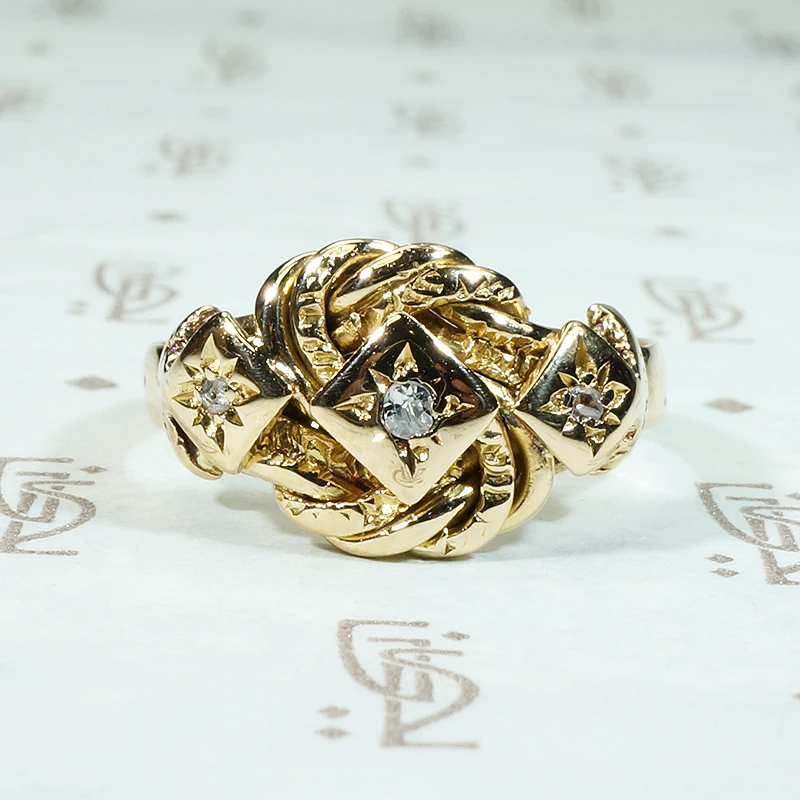 Diamond Set Love Knot 18ct Gold Band