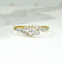 Exquisite Little Diamond Crossover Ring in Platinum & 18ct