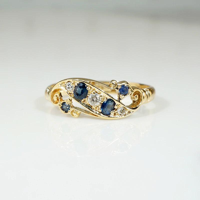 Jaunty Sapphire & Diamond Set 18ct Flourish Band