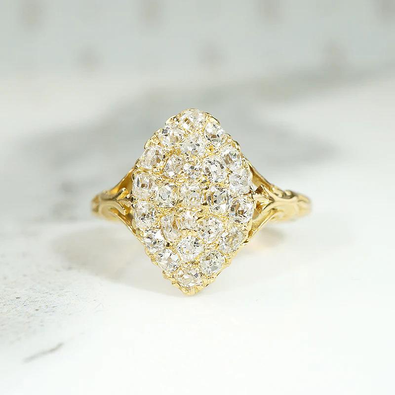 Curvy Diamond Cluster Navette Ring in 18ct Gold
