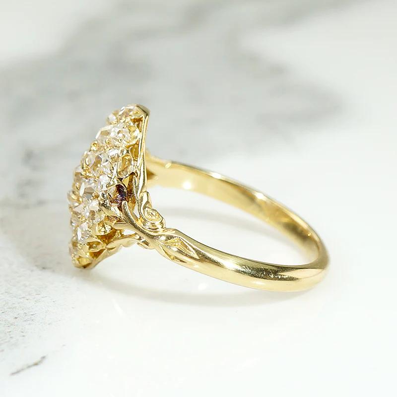 Curvy Diamond Cluster Navette Ring in 18ct Gold