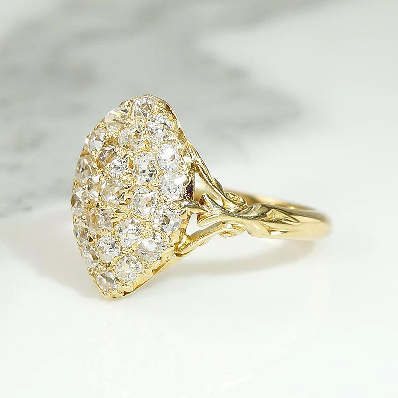 Curvy Diamond Cluster Navette Ring in 18ct Gold