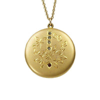 Antique Round Locket with hand engraved flowers and paste gems