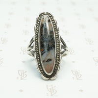 silver and oval picture agate ring with braided surround hand made southwest american