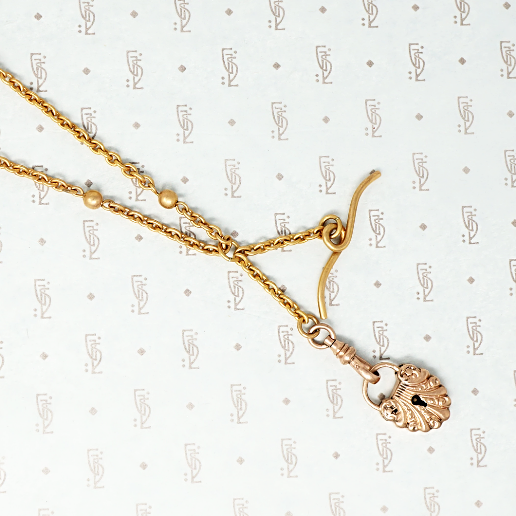 Fancy Rose Gold Filled victorian lock necklace close up with t bar