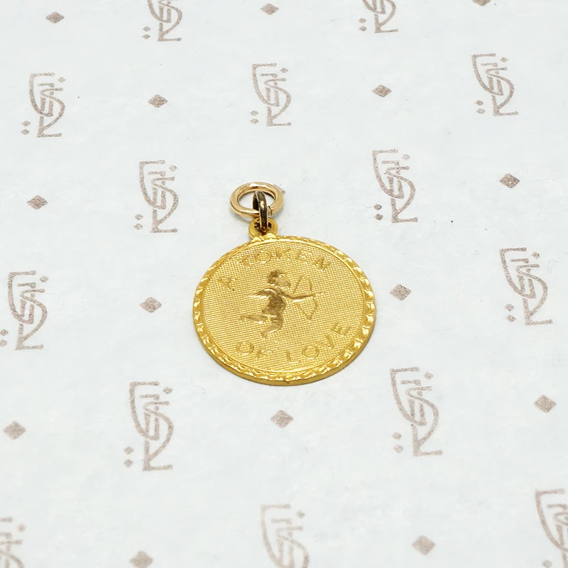 a token of love cupid charm gold filled circa 1950