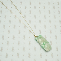 Auspicious Carved Jade Pendant with Pomegranate, Plum and Frog, back view.