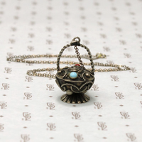 Ornate Silver Basket Charm Necklace