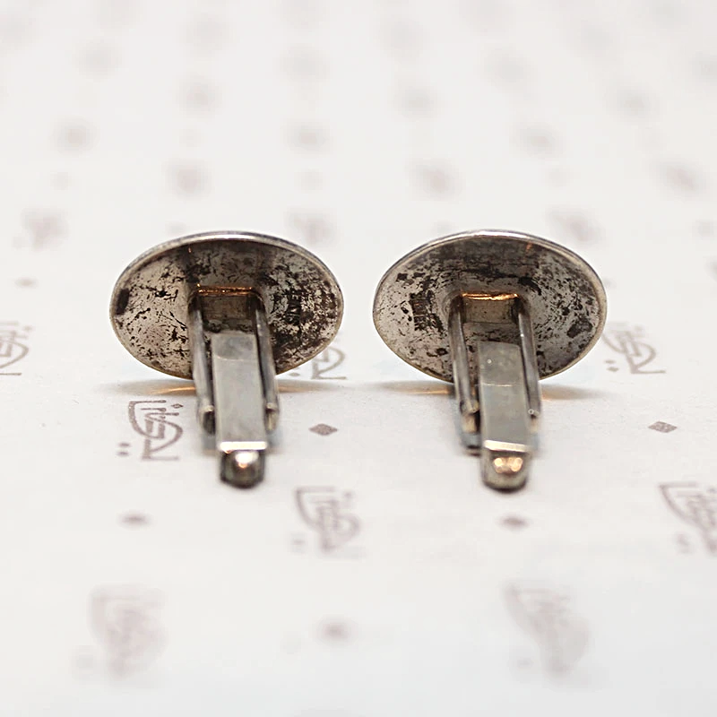 Engraved Silver Cufflinks with Western Flair