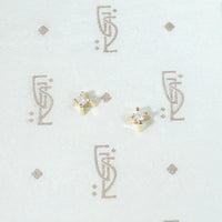 Tiny Diamond Studs in Modernist Gold Settings