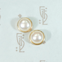 Creamy Half Pearls Nestled in Gold Bezel Studs