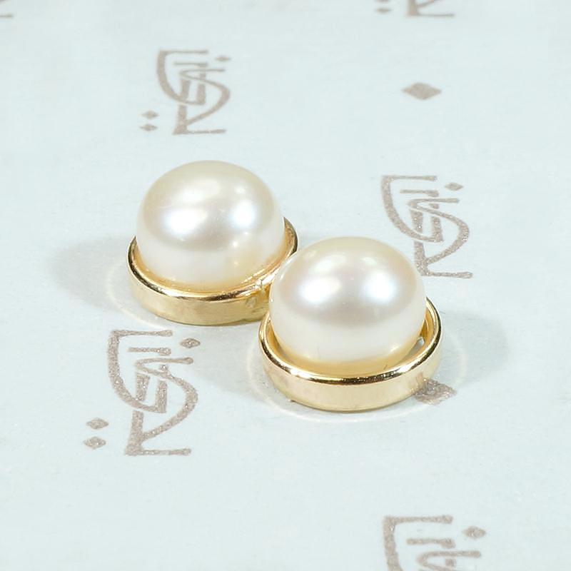 Creamy Half Pearls Nestled in Gold Bezel Studs