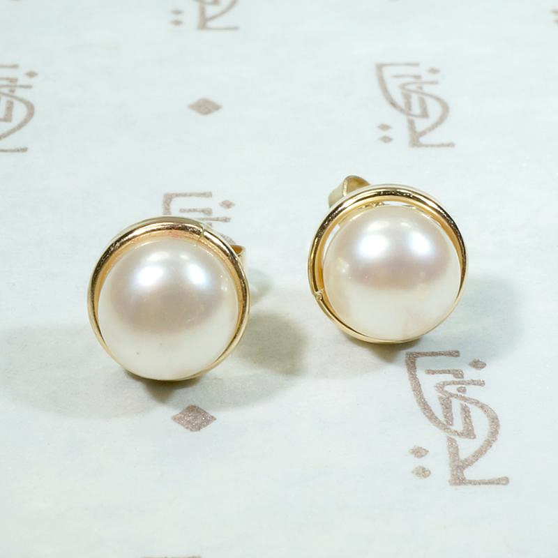 Creamy Half Pearls Nestled in Gold Bezel Studs