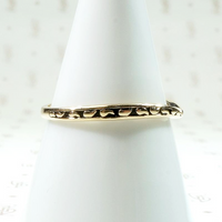 curved gold wedding band