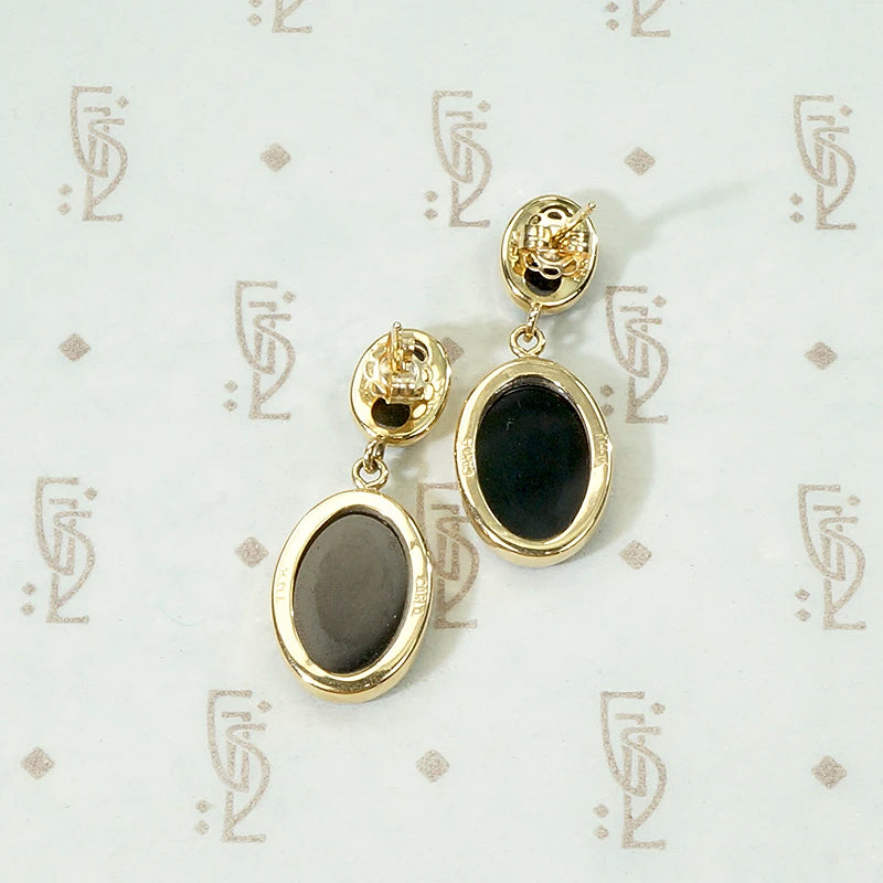 Sleek Dangle Earrings in Onyx & Gold
