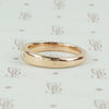 Vintage marquis diamond rose gold band by 720, left view.