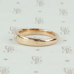Vintage marquis diamond rose gold band by 720, left view.