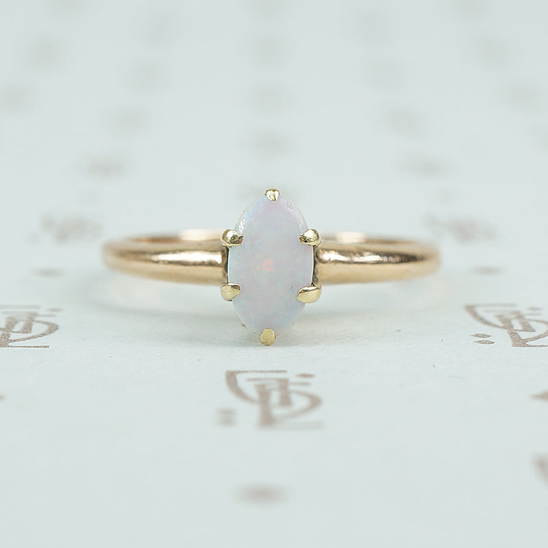 marquis  opal gold solitaire ring