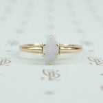 marquis  opal gold solitaire ring