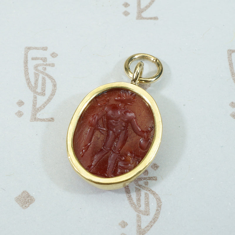 ancient roman carnelian intaglio featuring mercury set in an 18k recycled gold bezel 