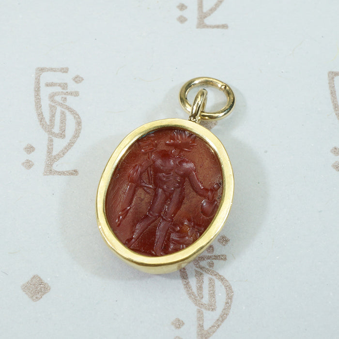 ancient roman carnelian intaglio featuring mercury set in an 18k recycled gold bezel 