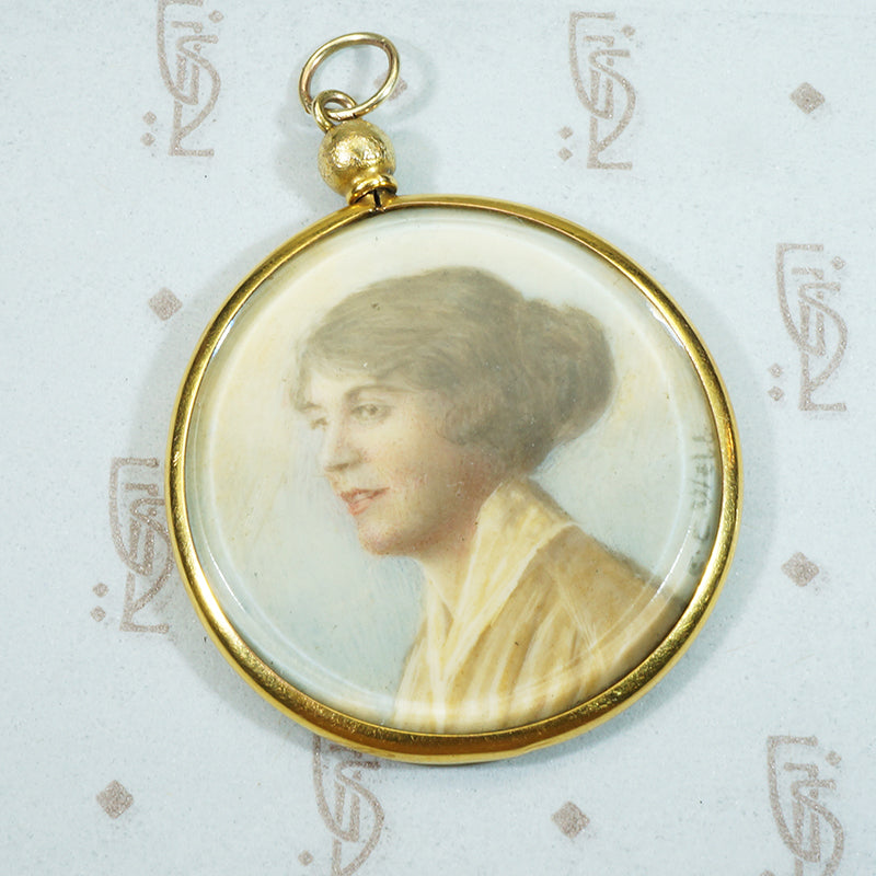 Hand painted minature portrait in 14k yellow gold double sided locket