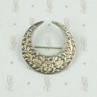 victorian crescent moon brooch with applied rose and green gold flowers