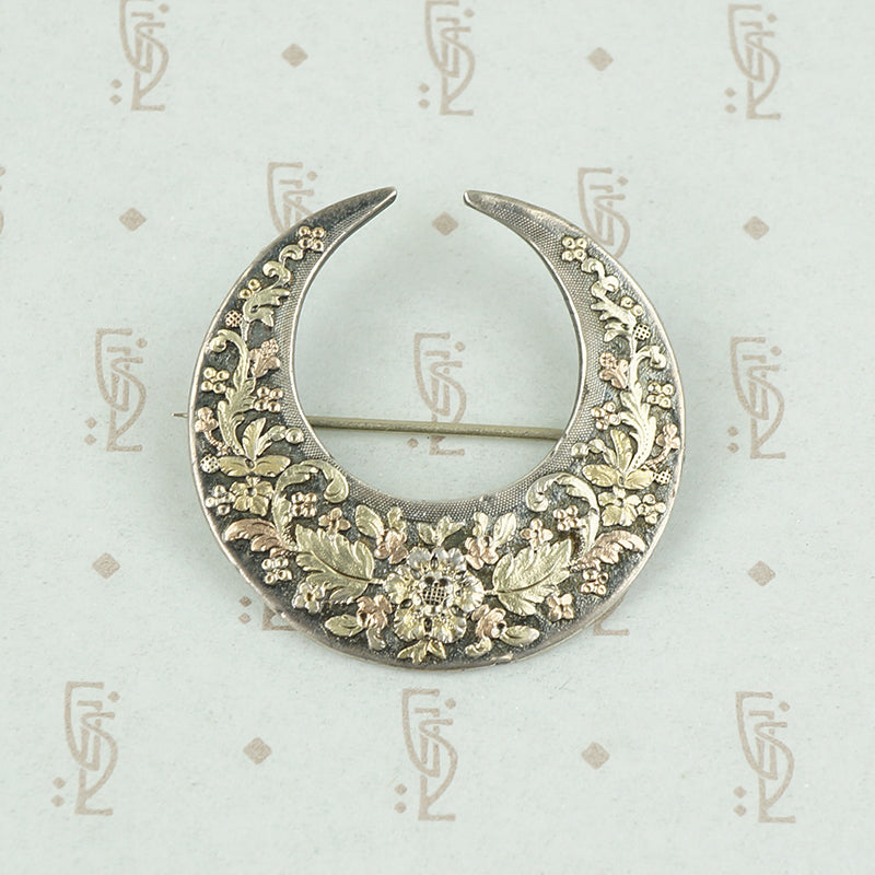 victorian crescent moon brooch with applied rose and green gold flowers