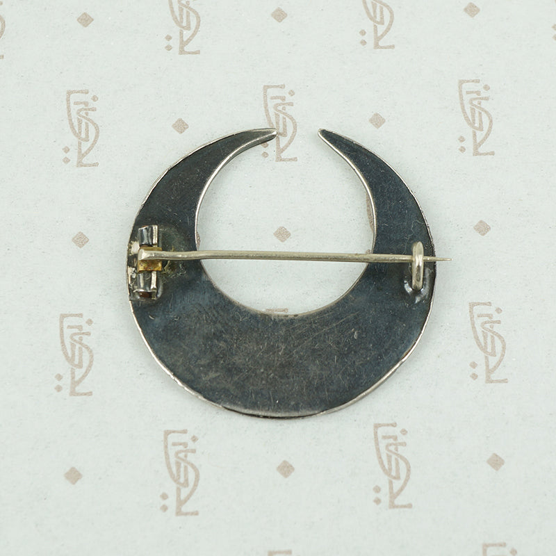 back of moon and flowers brooch showing c clasp