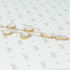 moonstone necklace in gold side view