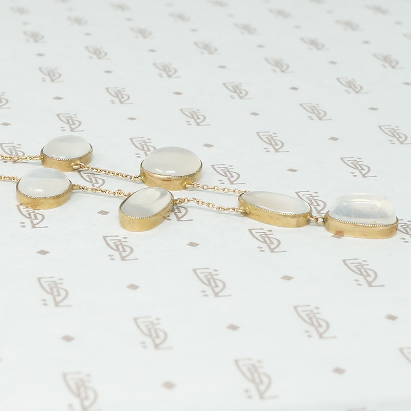 moonstone necklace in gold side view