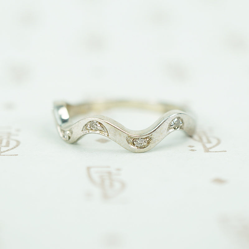 14k recycled white gold hand made wave band set with 5 diamonds in crescent moons