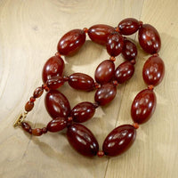 Rare Red Amber Beads with Gold Clasp