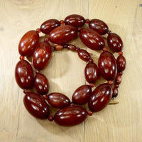 Rare Red Amber Beads with Gold Clasp