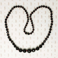 Faceted Round Deep Red Bakelite Beads