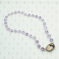 1920s Amethyst Bead Necklace with Decorative Clasp. Back view.