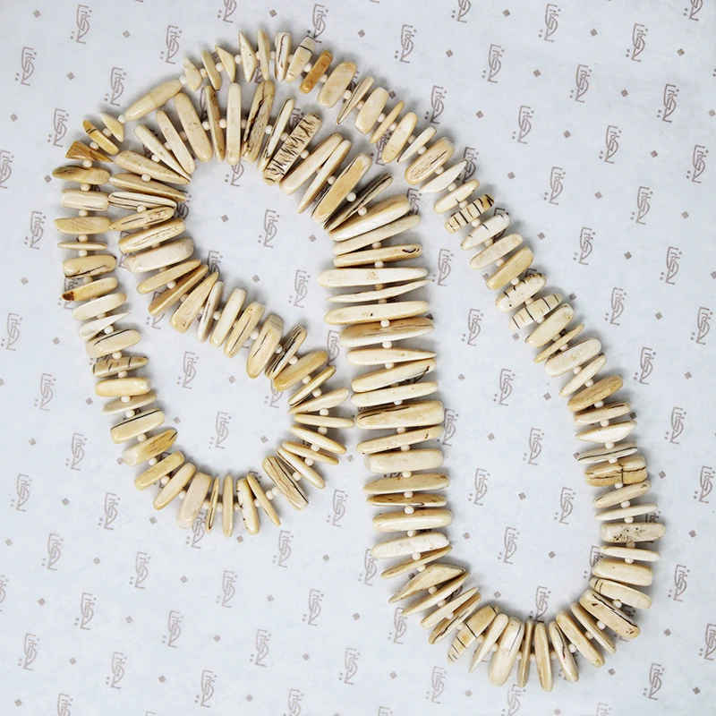 Fierce Petrified Walrus Tusk Necklace