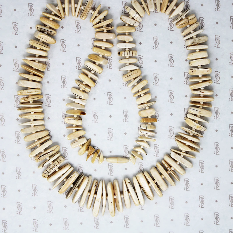 Fierce Petrified Walrus Tusk Necklace