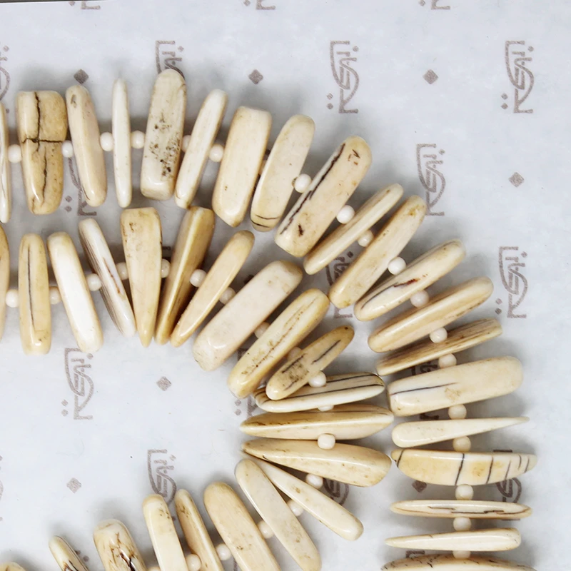 Fierce Petrified Walrus Tusk Necklace