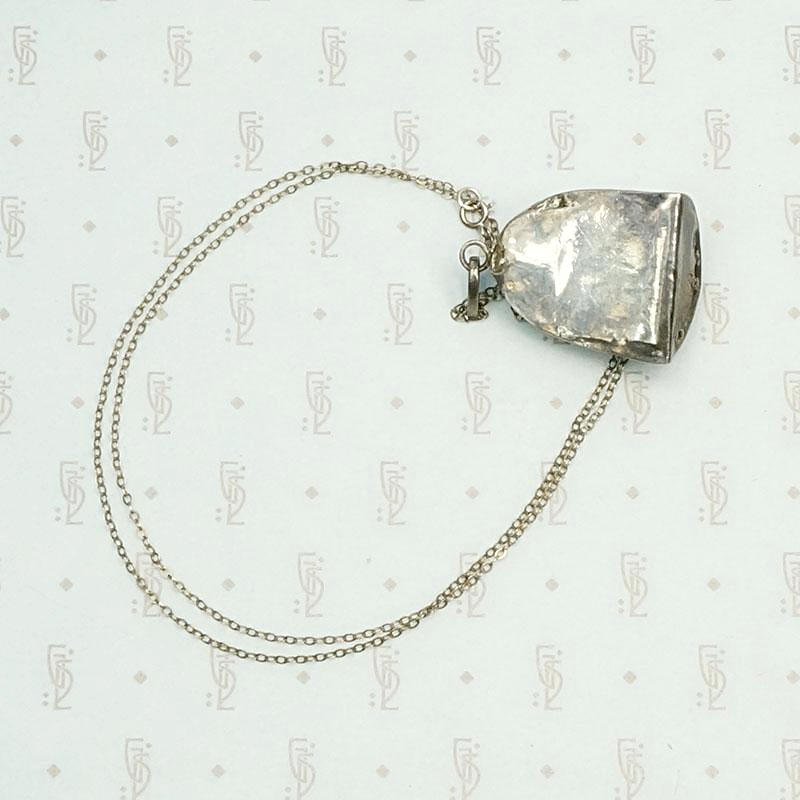 Carved Warthog Tusk in Silver Pendant, back view.