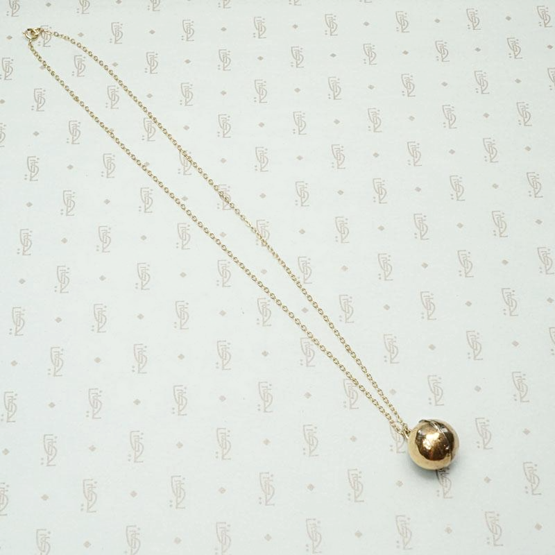 Unusual Hinged Ball Locket