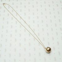 Unusual Hinged Ball Locket