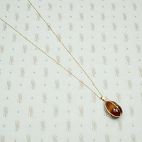 Agate Pendant Gift Wrapped in Gold Ribbon