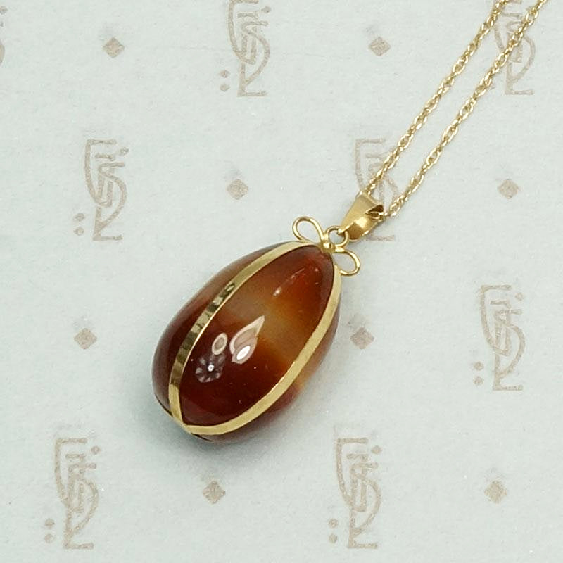 Agate Pendant Gift Wrapped in Gold Ribbon