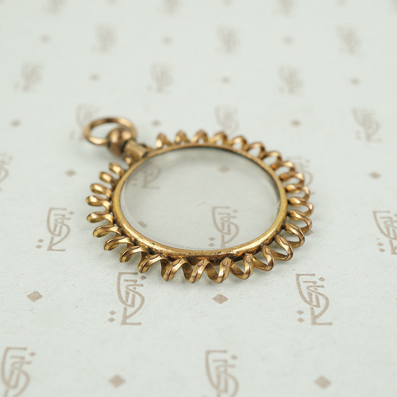 Spiral Framed Double-Sided Locket