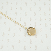 Back view of gold filled compass necklace
