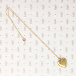 Simple & Sweet Heart-Shaped Locket with Great Photos
